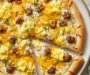 Breakfast Pizza with Sausage, Eggs, and Cheddar