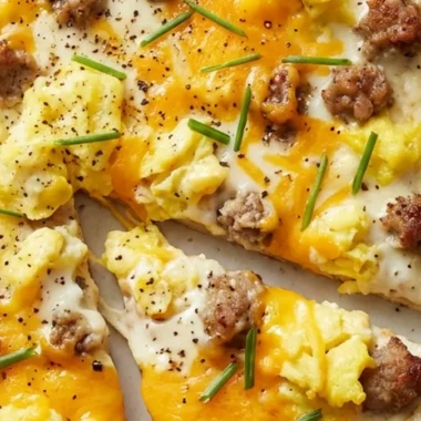 Breakfast Pizza with Sausage, Eggs, and Cheddar finished recipe